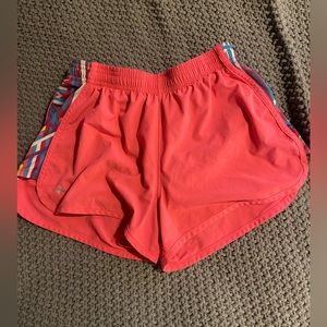 Pink under Armour kid shorts.